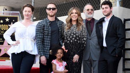 family photo of Wilson with her husband ,sons and daughter inlaw